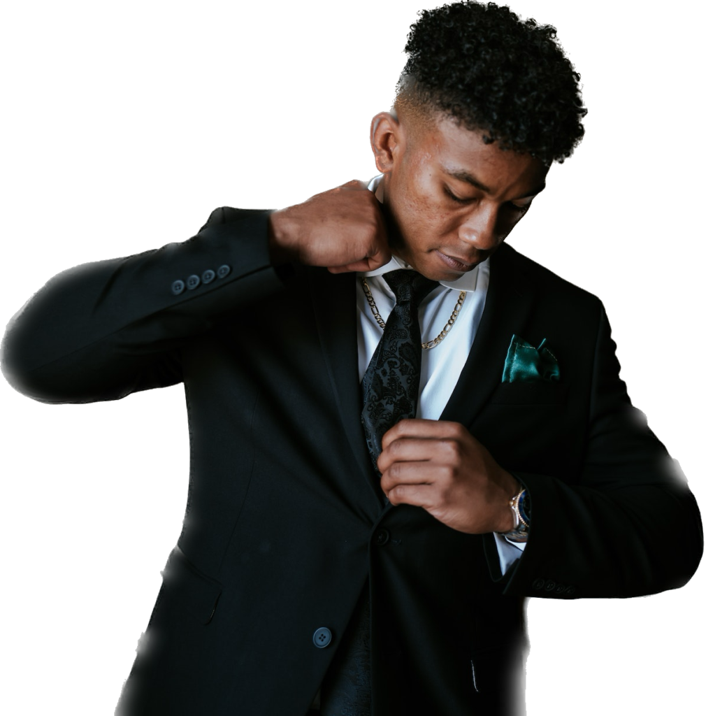 young black man getting dressing in suit and tie